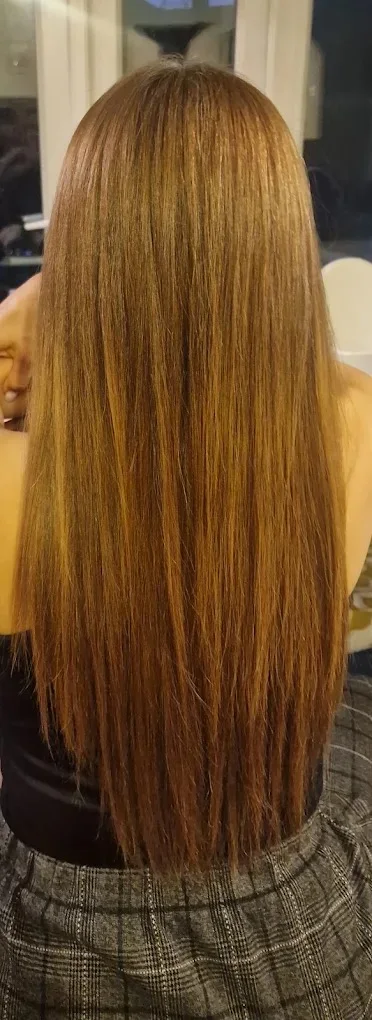 Long copper blonde hair after a colour refresh